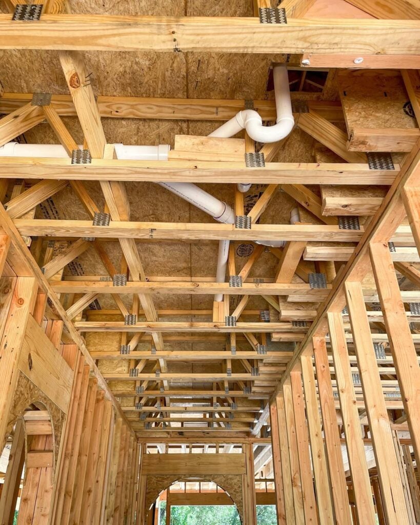 Plumbing pipe rough-in installation during new home construction in Aledo, TX