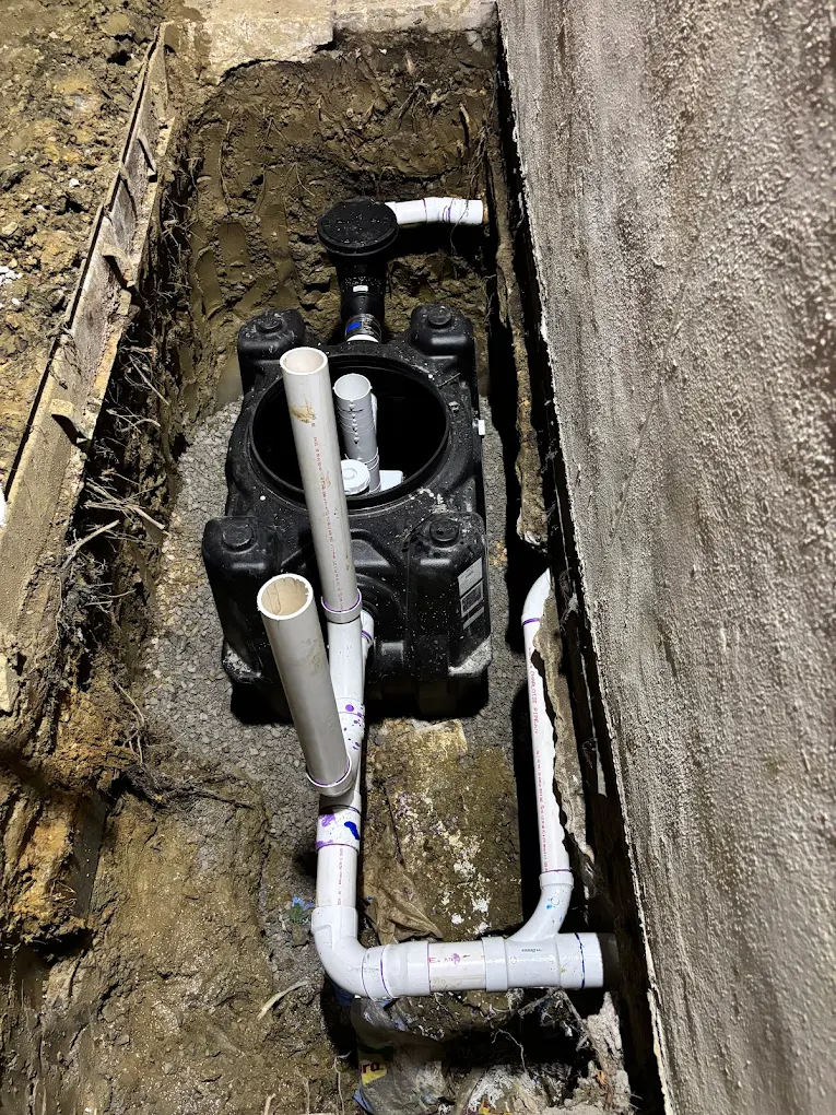 Underground plumbing pipe and valve installation in a trench, Aledo, TX