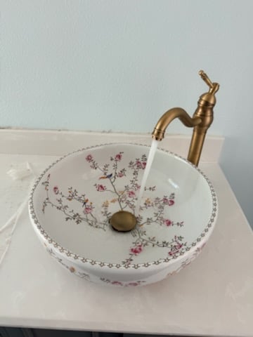 Decorative vessel sink and bathroom faucet installation in a home in Aledo, TX